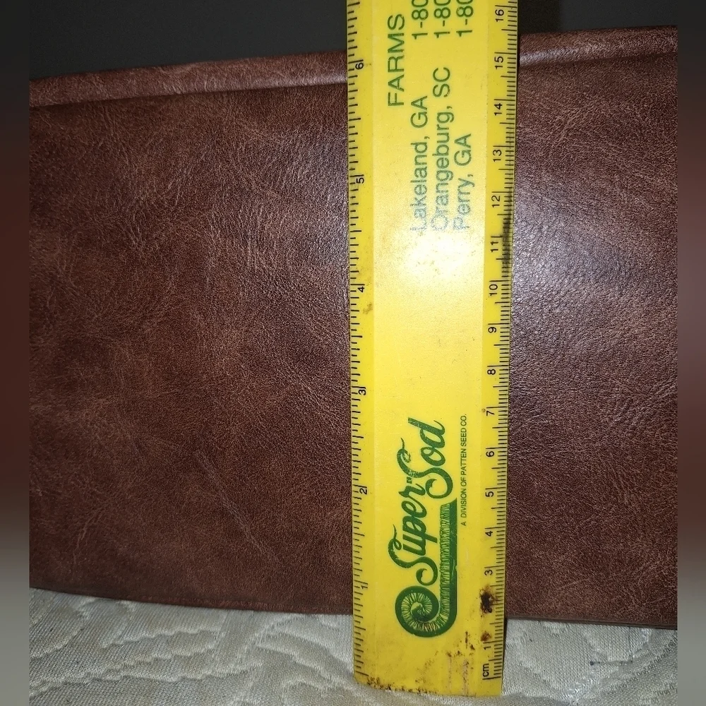 Unbranded soft leather (pleather) purse. It's in EUC, like new. 13